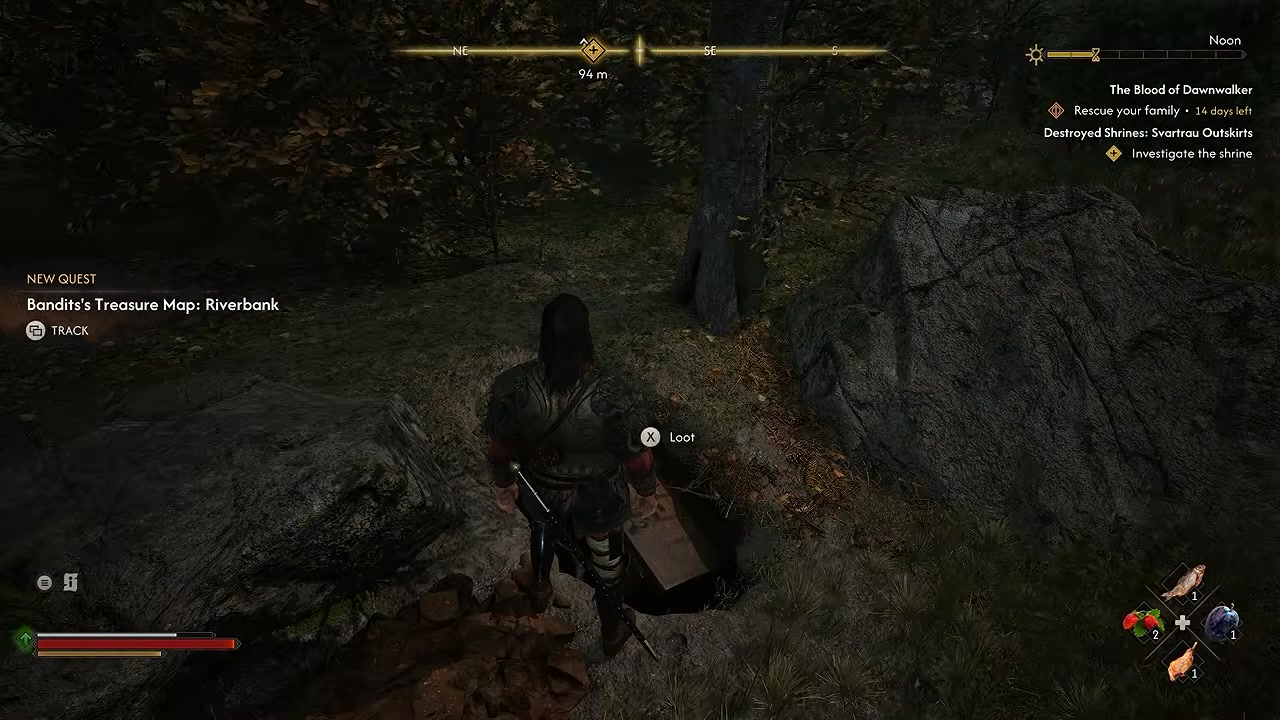 An exposed chest and Loot prompt between a tree, a large boulder and a smaller rock.