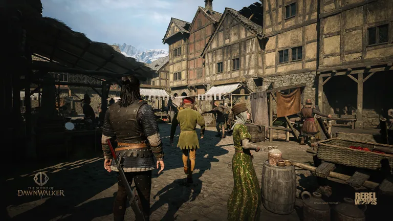 Coen walking through a busy medieval town street in an official Dawnwalker screenshot